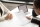 Company CEO and HR manager reading applicant resume or cv while employee waiting for questions, discussion and result during recruitment process in office. Concept of hiring, employment. Close up view